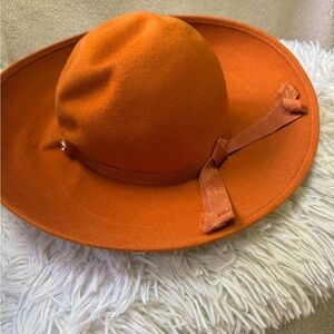 Henry Pollak, Inc. Wool burnt orange wide brim hat. “RITZ” Vintage union made.